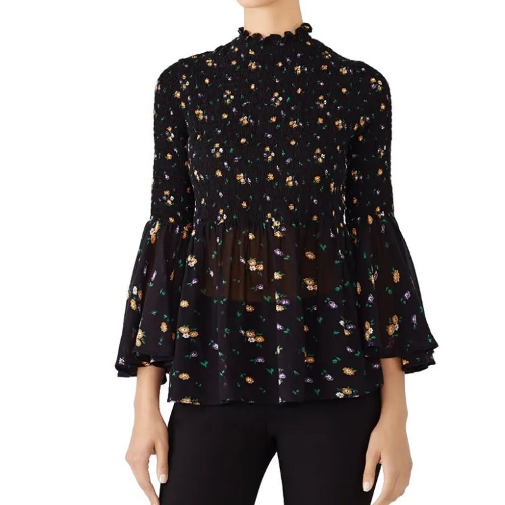 By Timo runched
Angel sleeve floral blouse size small